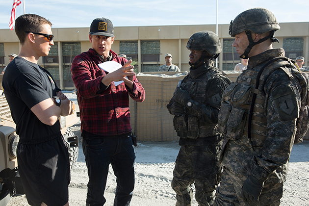Writer/director Jason Hall preps his actors for a battle scene.