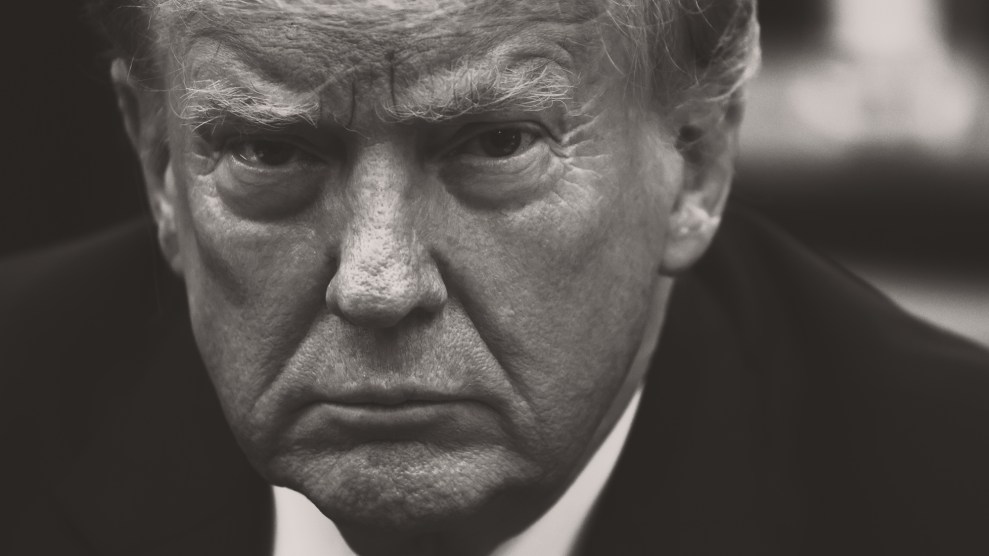 Black and white tight frame of Donald Trump's pursed-lipped face.