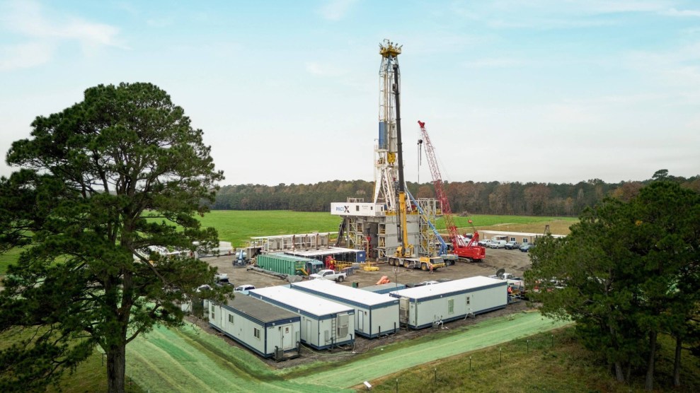 A construction project surrounded by green grass.