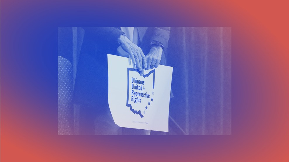 A red and blue tinted photo of hands holding a sign that reads "Ohioans united for reproductive rights."