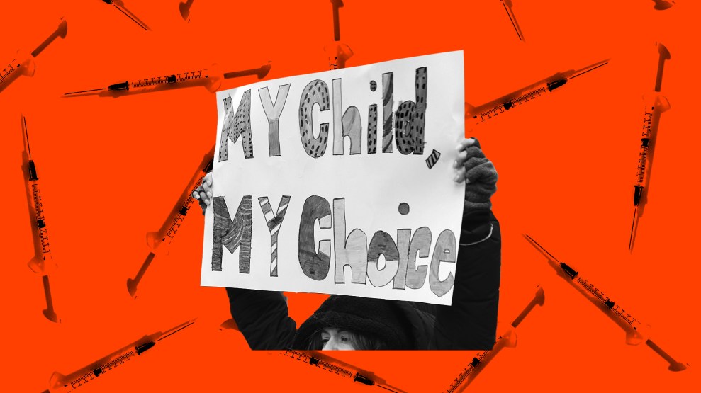 A protester holds up a handmade sign reading ‘MY Child, MY Choice’ in bold, hand-drawn letters. The person is dressed in a hooded coat, with only part of their face visible. The background is bright red with an overlay of scattered syringes.