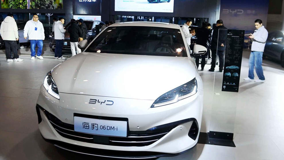 A white car with BYD on it.