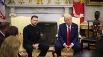 Volodymyr Zelenskyy and Donald Trump sit in a pair of pale yellow high-backed chairs in the Oval Office.