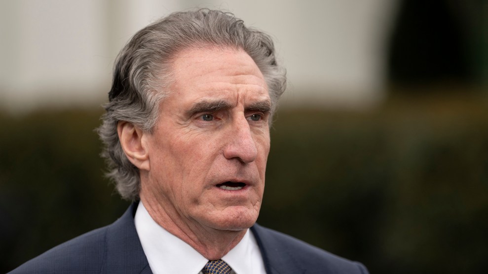 Man stares blankly with his mouth slightly open.