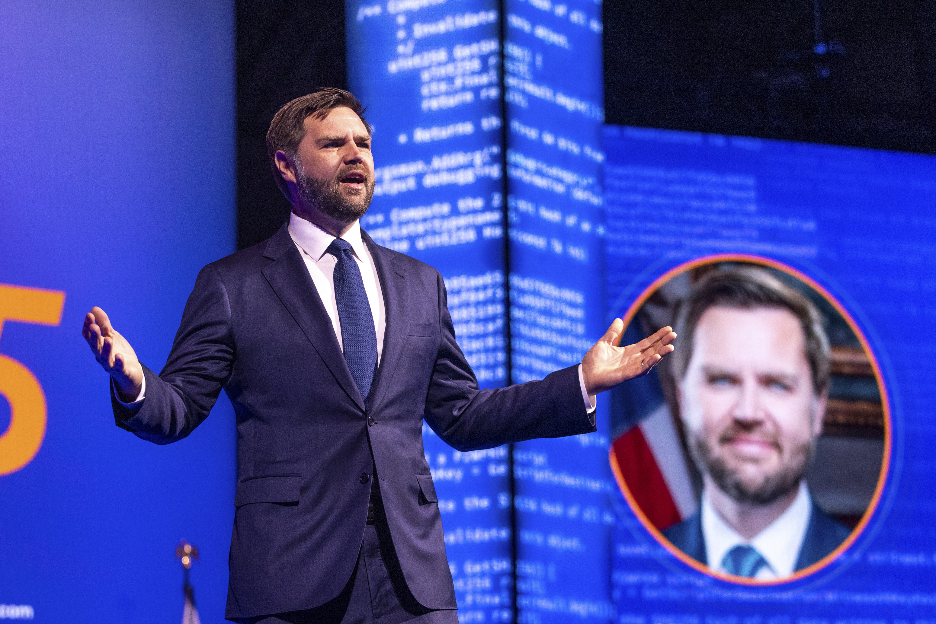 Vice President JD Vance speaking to conference attendees enthusiastically