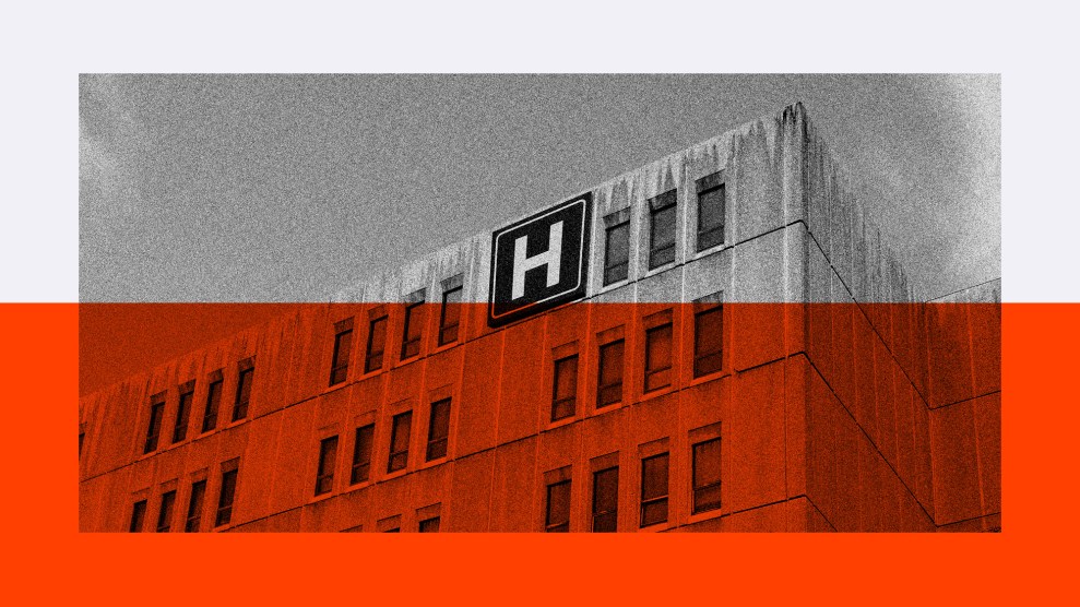 A grainy, black-and-white photo of the upper floors of a hospital building, with a large square sign featuring a white “H” on a black background near the roofline. The lower half of the image is overlaid with a bold red color block, creating a stark contrast and giving the image a dramatic, urgent tone.