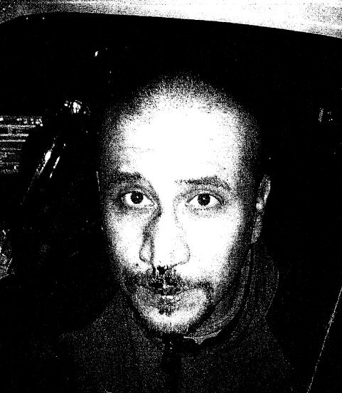The first on-scene photo of Zimmerman, which wasn't recovered from a police officer's cellphone until days after the killing: State of Florida